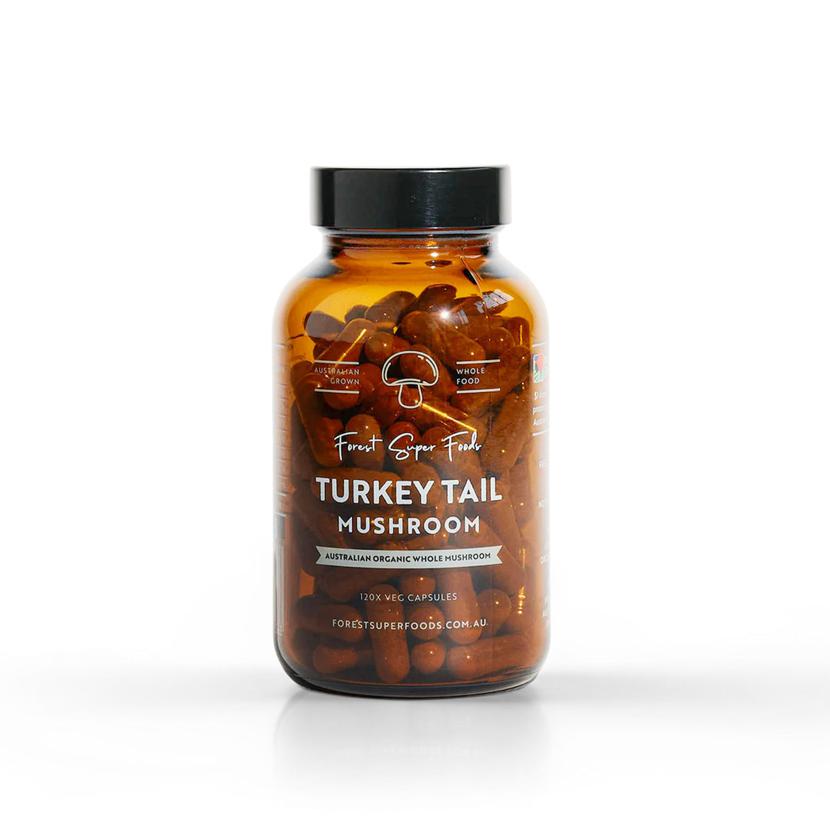 Australian Grown Turkey Tail Capsules in amber jar with whole freeze-dried mushrooms supporting gut balance by Forest Super Foods